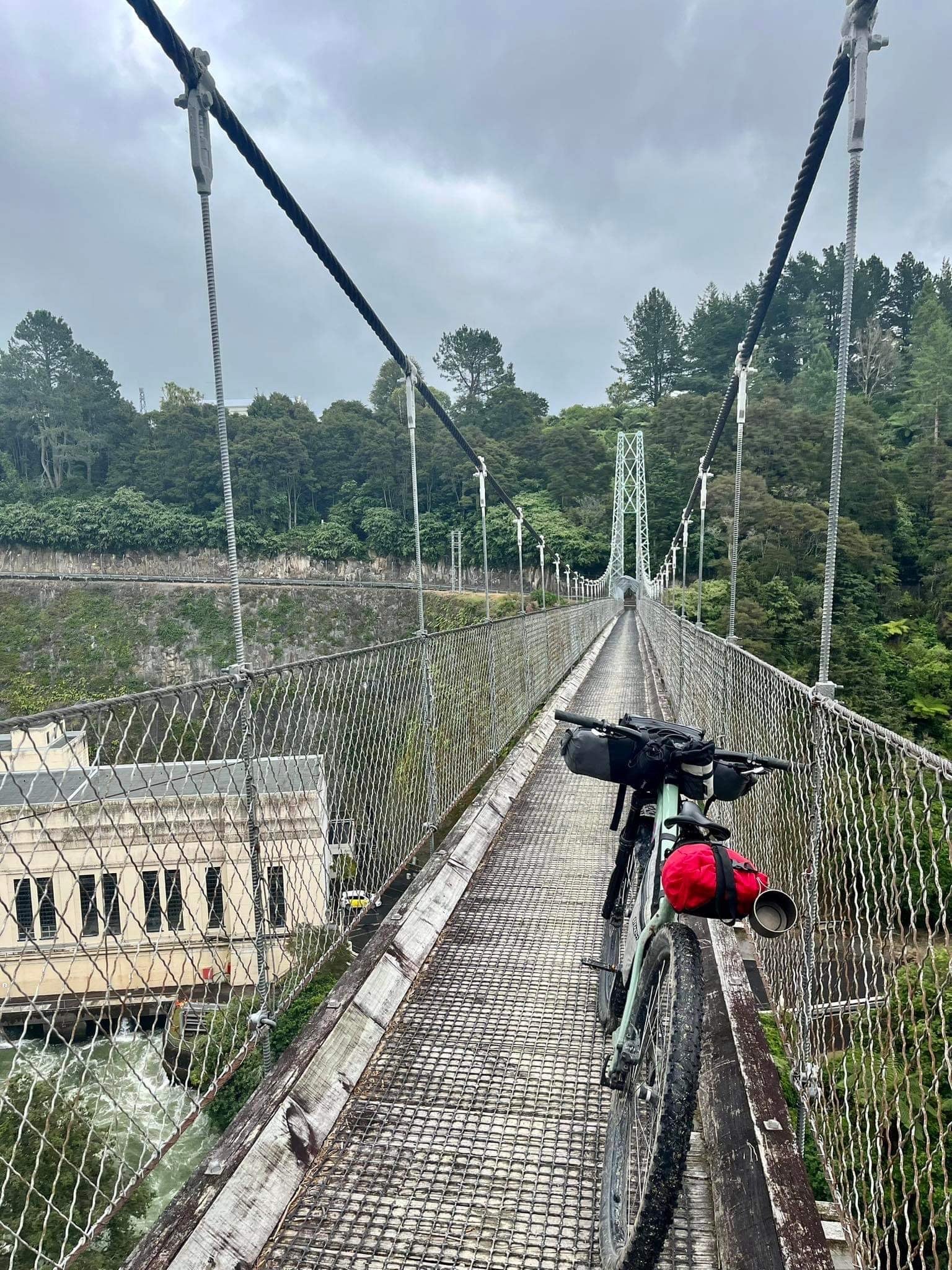 Swing bridge while bikepacking the rebel ride