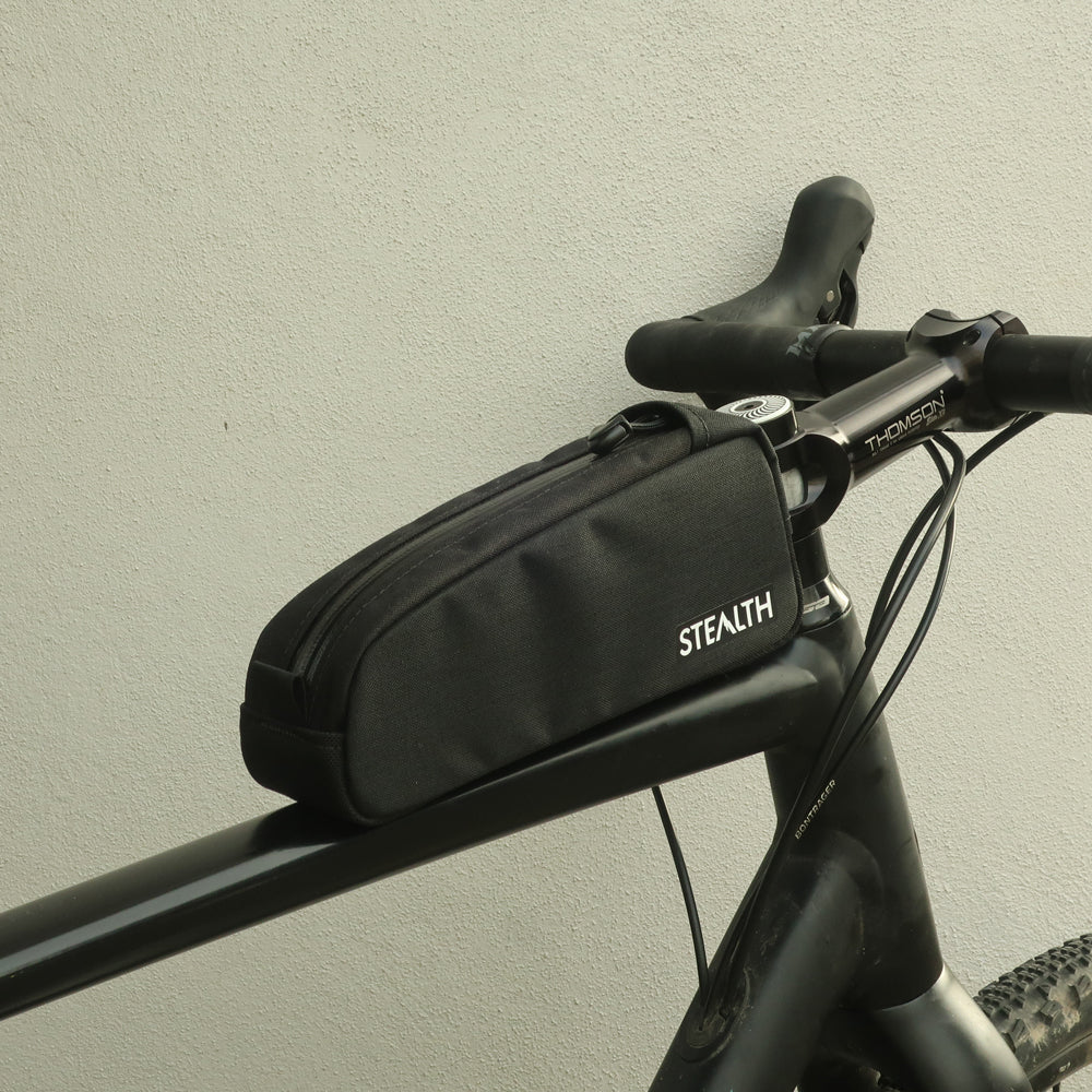 Bolt-on top loader top tube bag mounted on bike in black fabric made by Stealth Wellington NZ