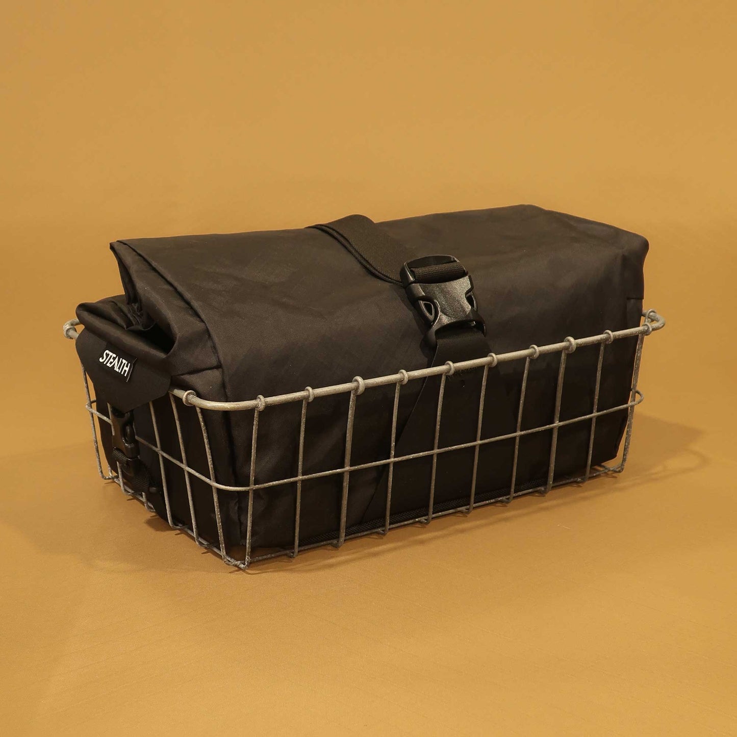 137 Carryall in black ecopak fitting inside a Wald basket front view made by Stealth Wellington NZ