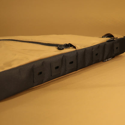 Custom full frame bike bag in Coyote fabric with dual zippers and full bolt-on attachment, designed for Auren Bikes, ideal for carrying gear on cycling adventures.