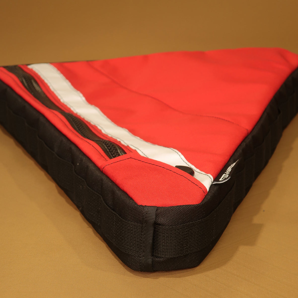 Custom red and black full frame bag showing phone pocket, and cable and hydration port, made for Bossi Grit Gravel bike