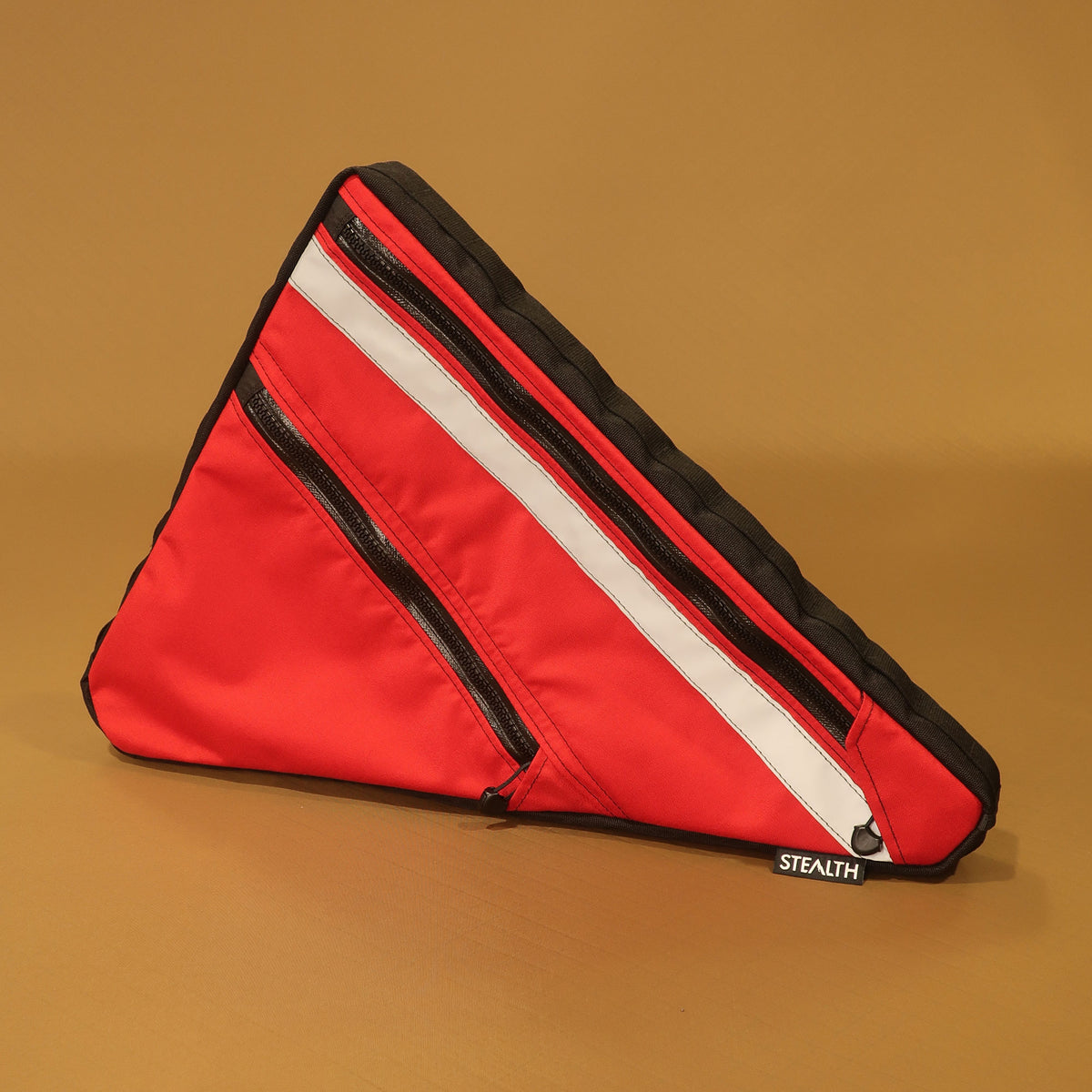 Red custom full frame bag with double zips and reflective strip, for Bossi Grit gravel bike by Stealth Adventure Equipment.
