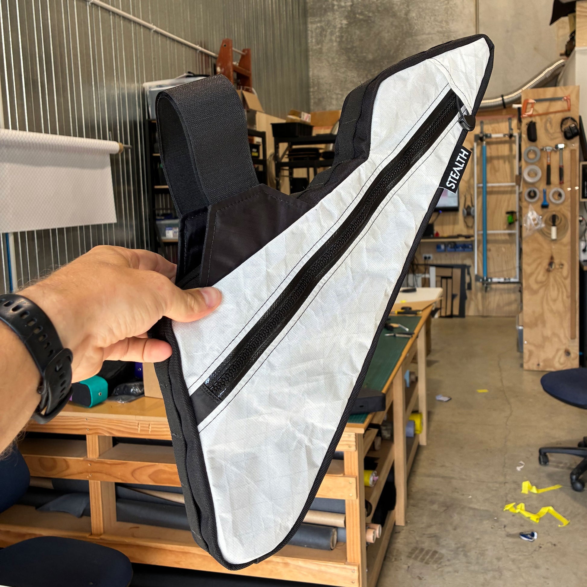 Handmade white and black single zip bikepacking frame bag designed for Cervelo CFS5 medium gravel bike.