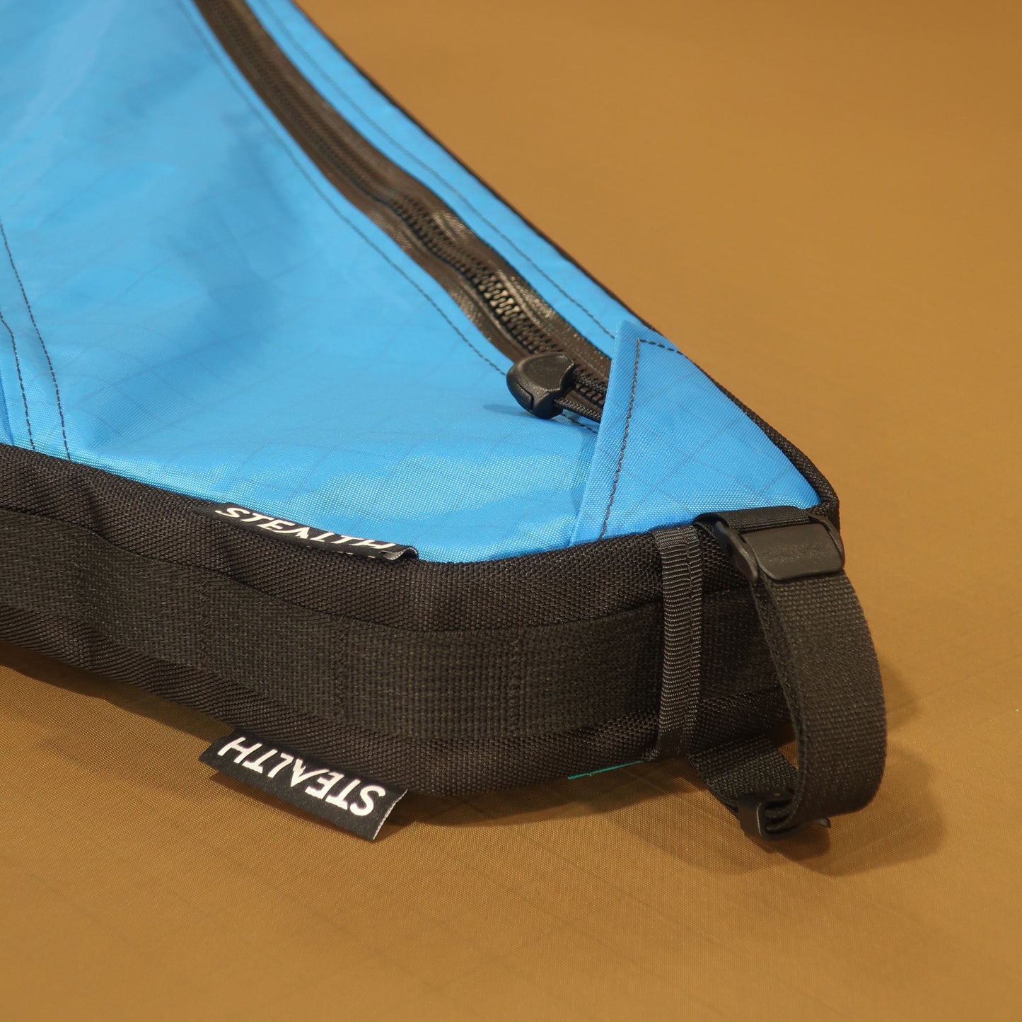 Custom blue full frame bag with double zips, camlock strap, H2O and cable port, designed for Curve GXR4 bikes, made by Stealth in New Zealand.