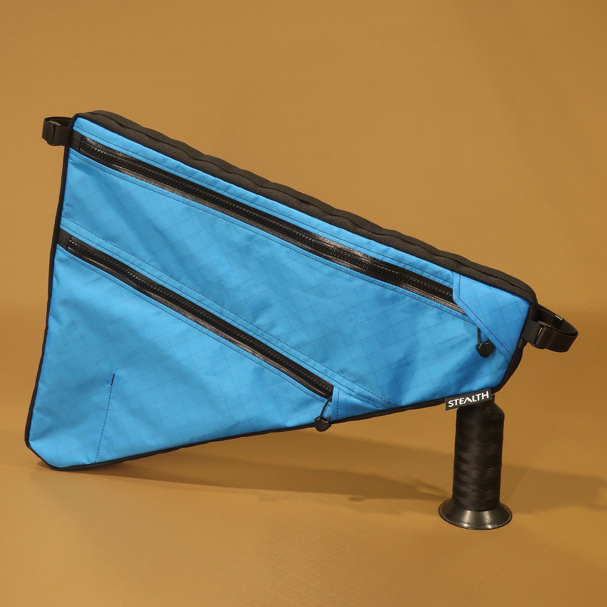 Custom blue Curve GXR4 full frame bag featuring double zips and compartments, designed for bikepacking and cycle touring