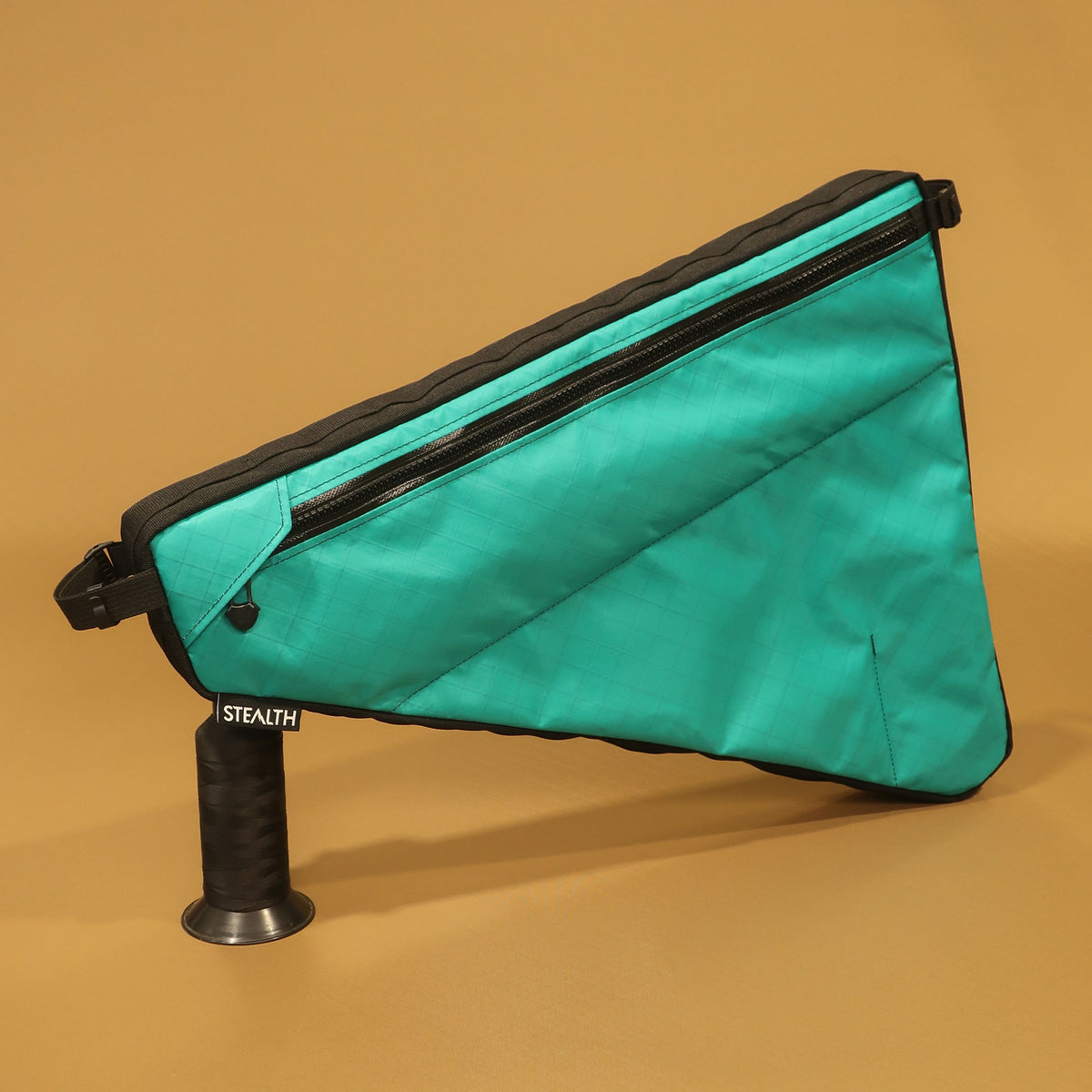 Custom teal full frame bag with double zips, map pocket, and strap attachments, designed for Curve GXR4 bikepacking bike; handmade in New Zealand