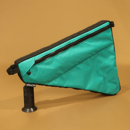 Custom teal full frame bag with double zips, map pocket, and strap attachments, designed for Curve GXR4 bikepacking bike; handmade in New Zealand