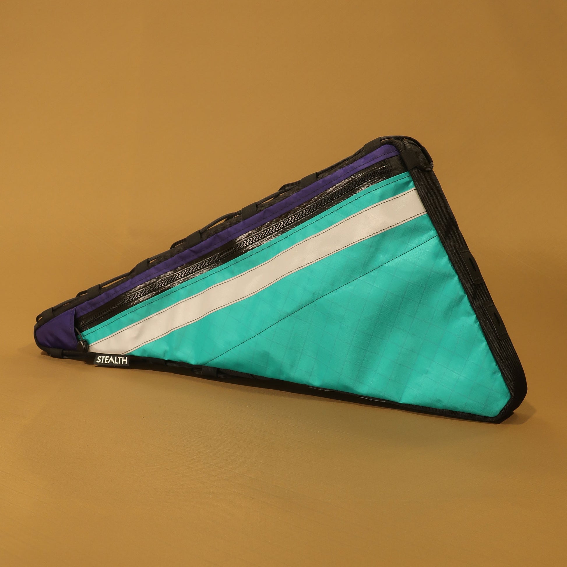 Custom double zip frame bag in teal purple and reflective showing exterior map pocket made by Stealth Wellington NZ