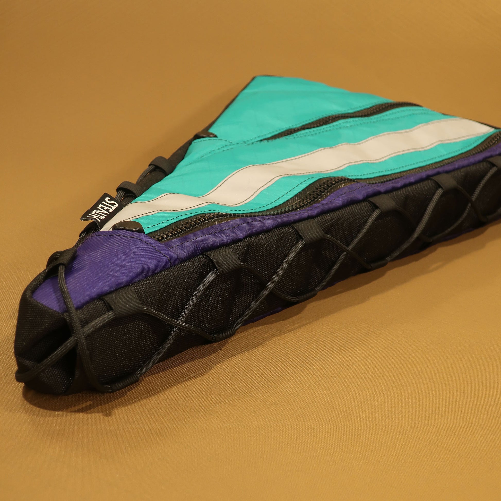 Custom double zip frame bag showing lace-up attachment detail and H20 port made by Stealth Wellington NZ