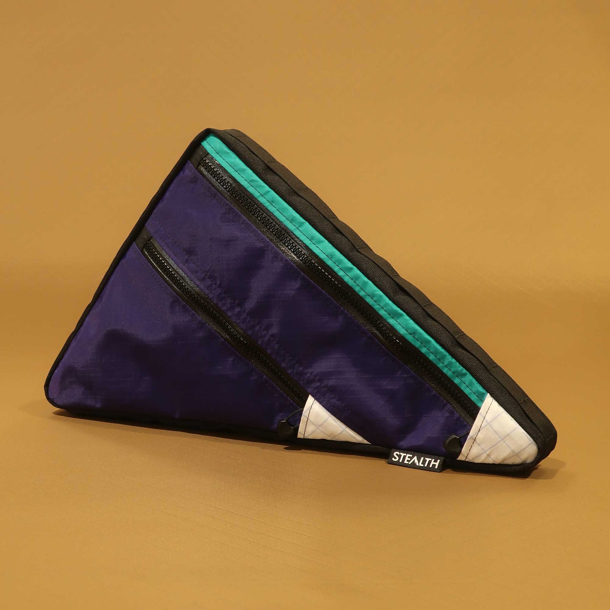 Custom double zip frame bag in purple Ecopak with teal and white accents made by Stealth Wellington NZ