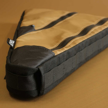 Custom bikepacking frame bag in coyote showing H2O hydration and cable port detail made by Stealth Wellington NZ