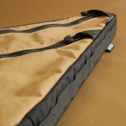 Custom frame bag close up showing daisy chain attachment system for bikepacking made by Stealth Wellington NZ