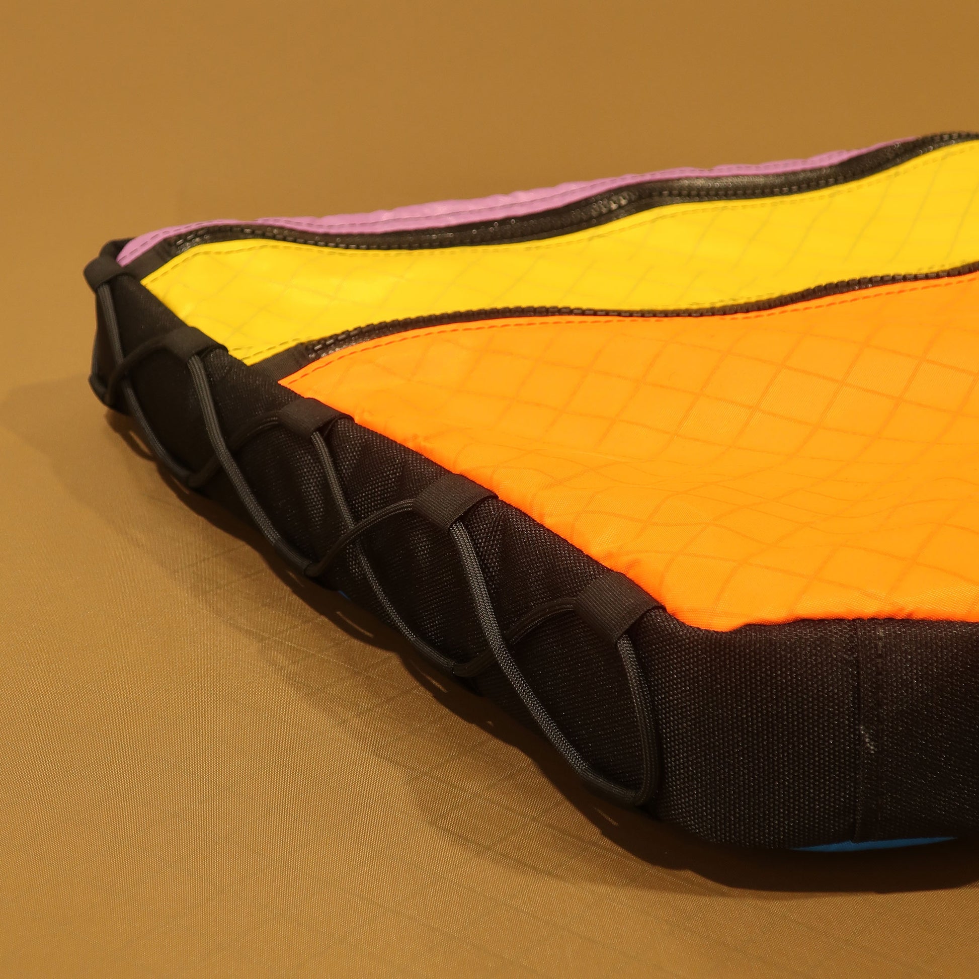 Custom frame bag for Kona Rove showing lace-up attachment in orange yellow and lilac Ecopak made by Stealth Wellington NZ