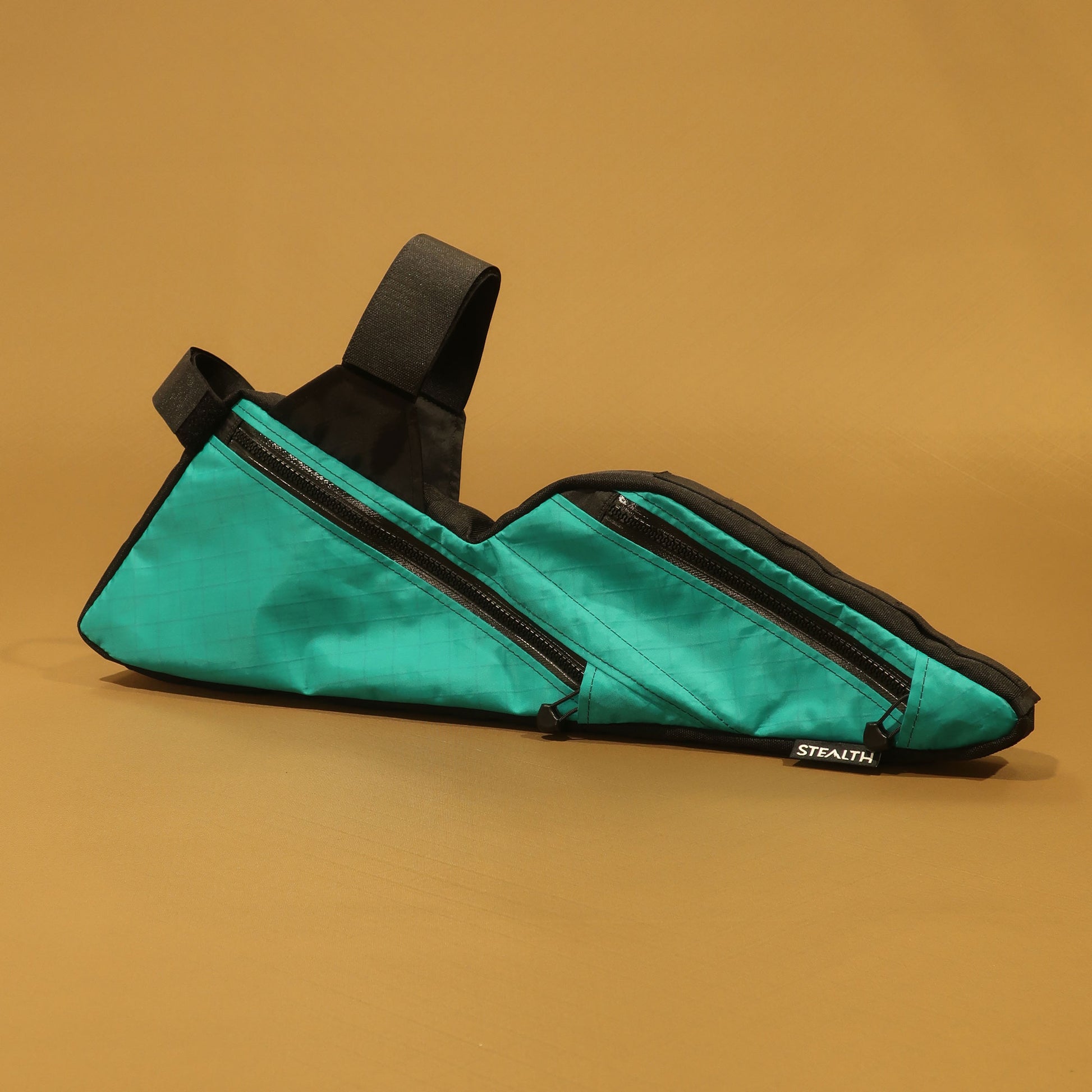 ustom full suspension frame bag for Yeti with double zips in teal Ecopak fabric made by Stealth Wellington NZ