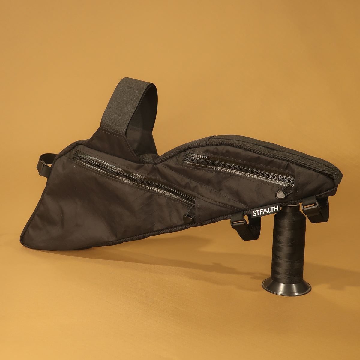 Black custom full suspension frame bag with double zip compartments and bolt-on attachment for a Specialized Chisel XL.