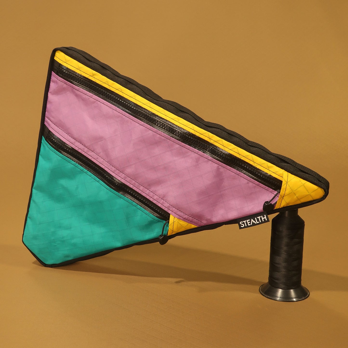 Handmade multicolour custom frame bag with double zips and compartments with adjustable hook and loop attachment, made in New Zealand.
