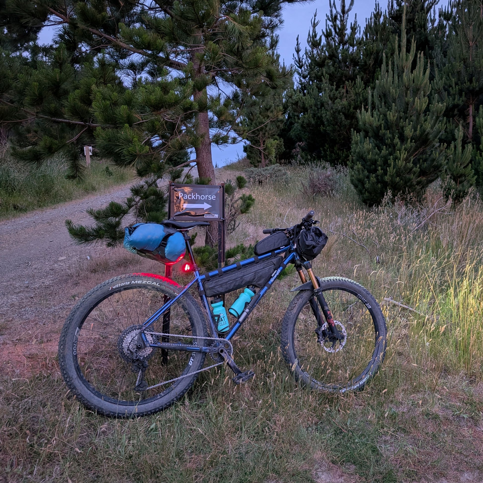 Esker Hayduke custom half frame bag and top tube bag in Ultra200 black on bikepacking trail made by Stealth Wellington NZ