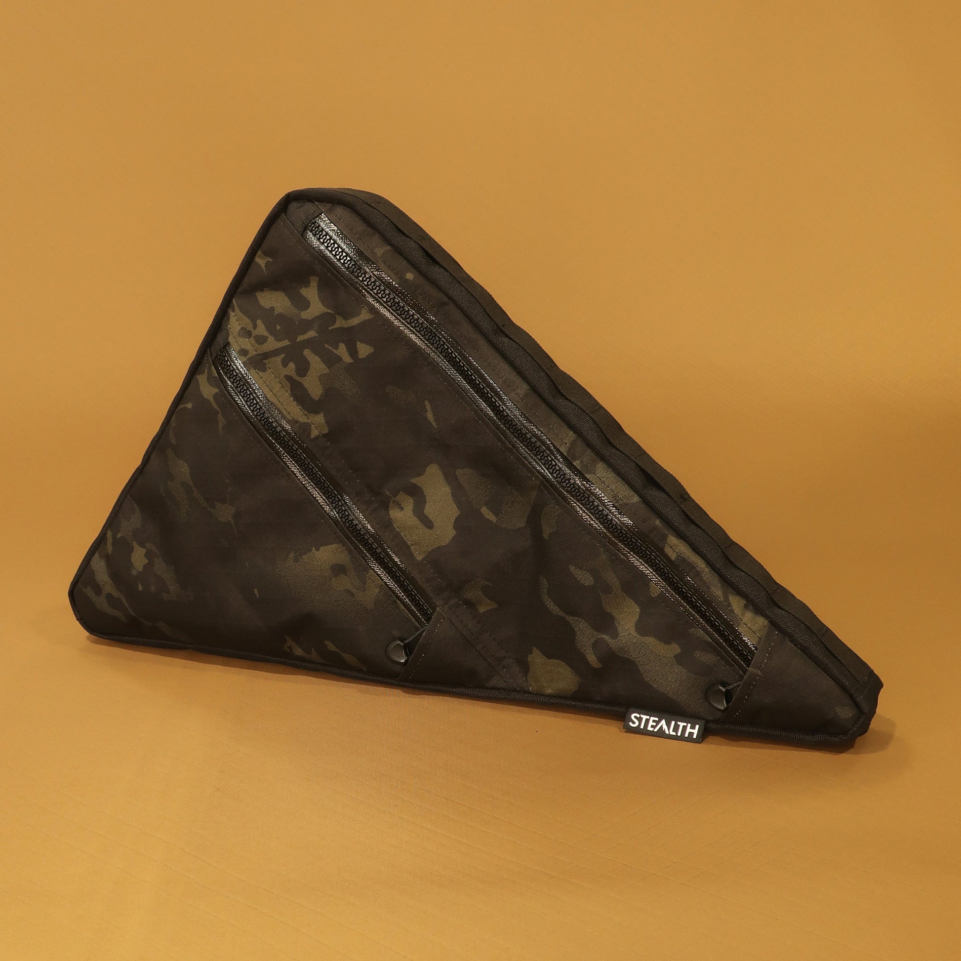 Custom medium Multicam black full frame bag with double zippers and velcro attachments, designed for the Canyon Grail CFR, by Stealth Adventure Equipment.