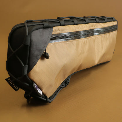 Custom half frame bag in coyote EPX200 fabric showing front zippered pocket and attachment system made by Stealth Adventure Equipment Wellington NZ