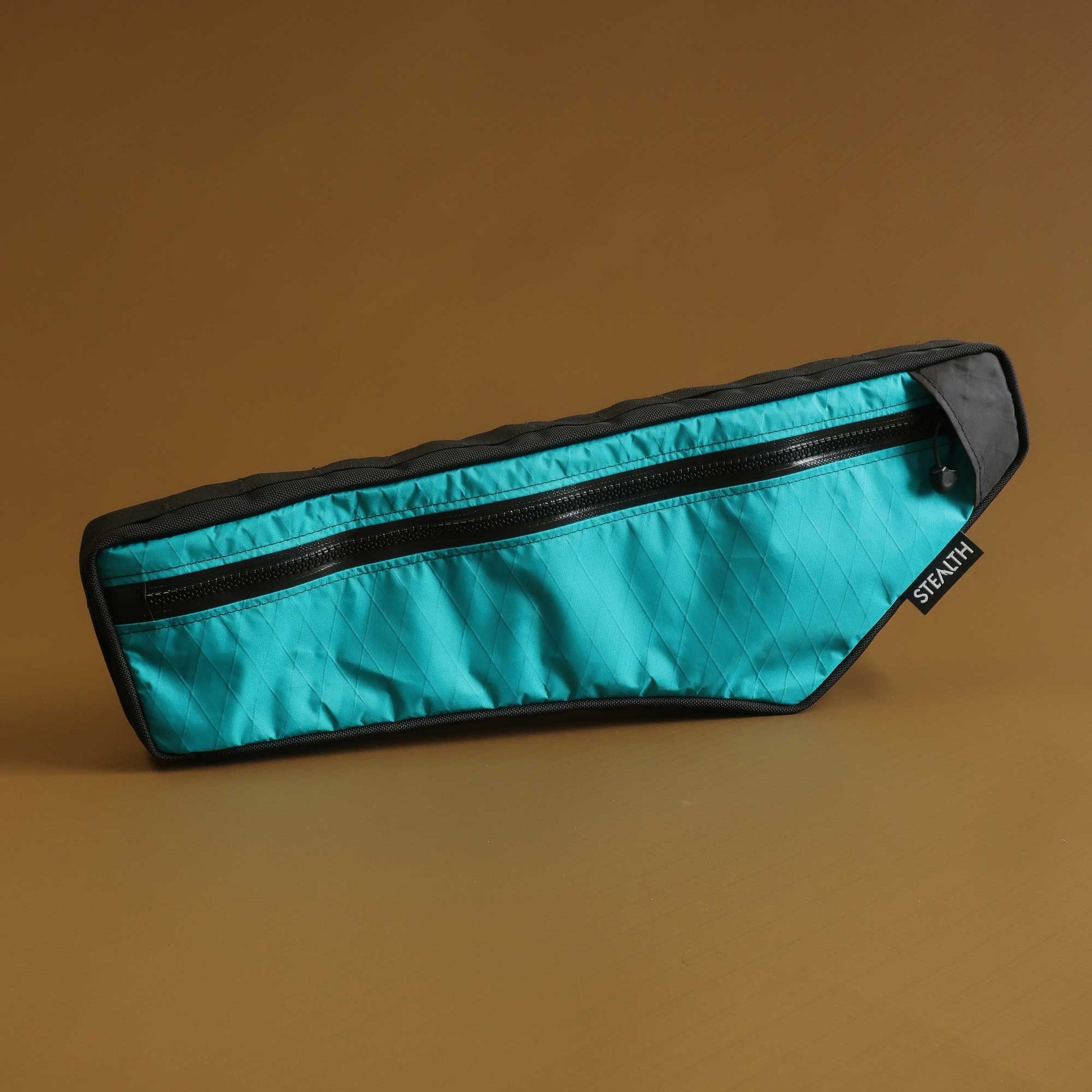 Bikepacking half frame bag in teal with single water resistant zip for MTB or gravel made by Stealth Wellington NZ