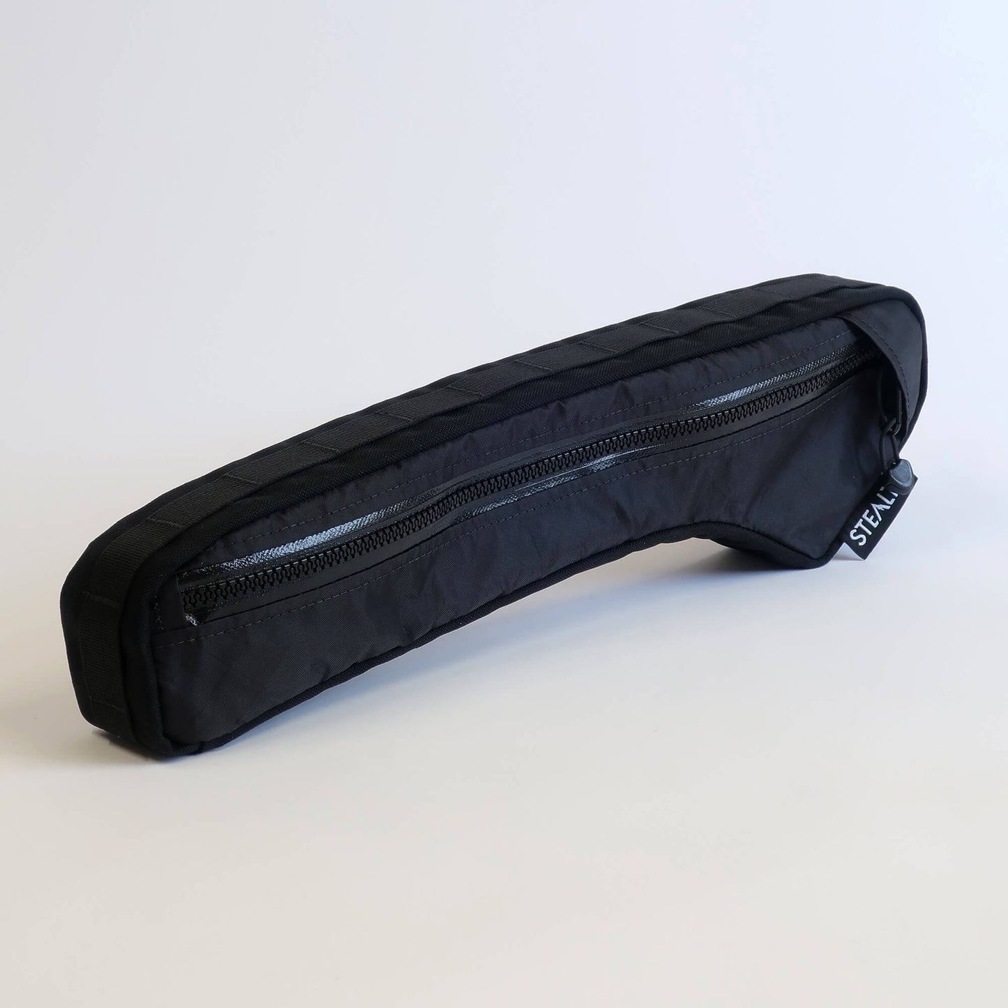 Half frame bag with water resistant zip