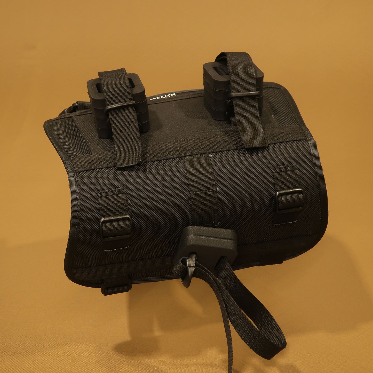 Bikepacking handlebar harness showing back panel with bar attachment hardware made by Stealth Wellington NZ