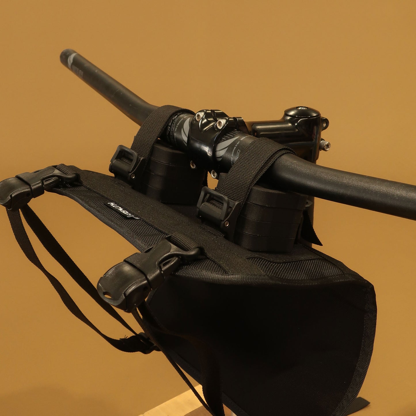 Heaphy handlebar harness attachment straps and buckles close up on bike bars made by Stealth Wellington NZ