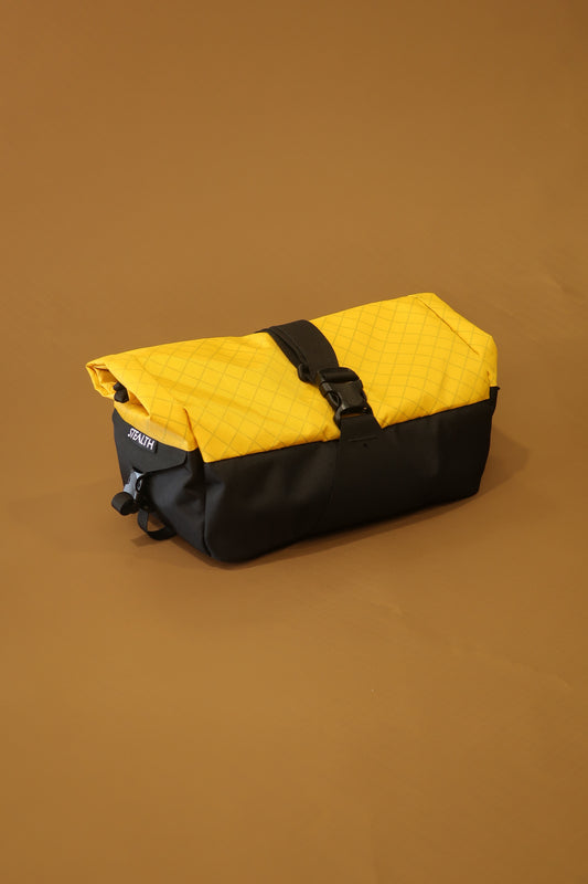 Yellow and black roll top 18 litre basket bag with quick release buckle, designed to fit a Wald 137 basket