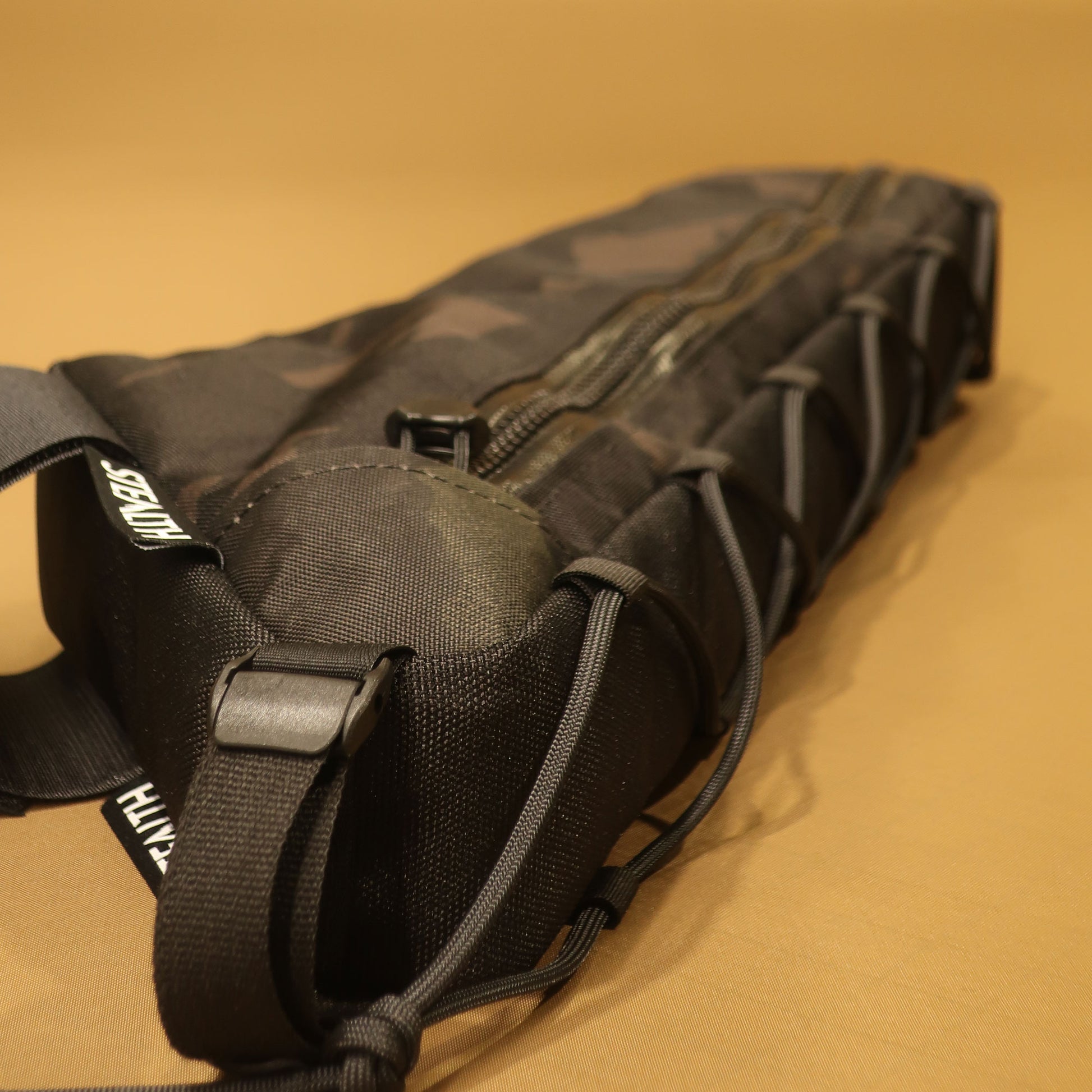 Kona Rove custom half frame bag in Multicam Black close-up of lace-up attachment made by Stealth Wellington NZ