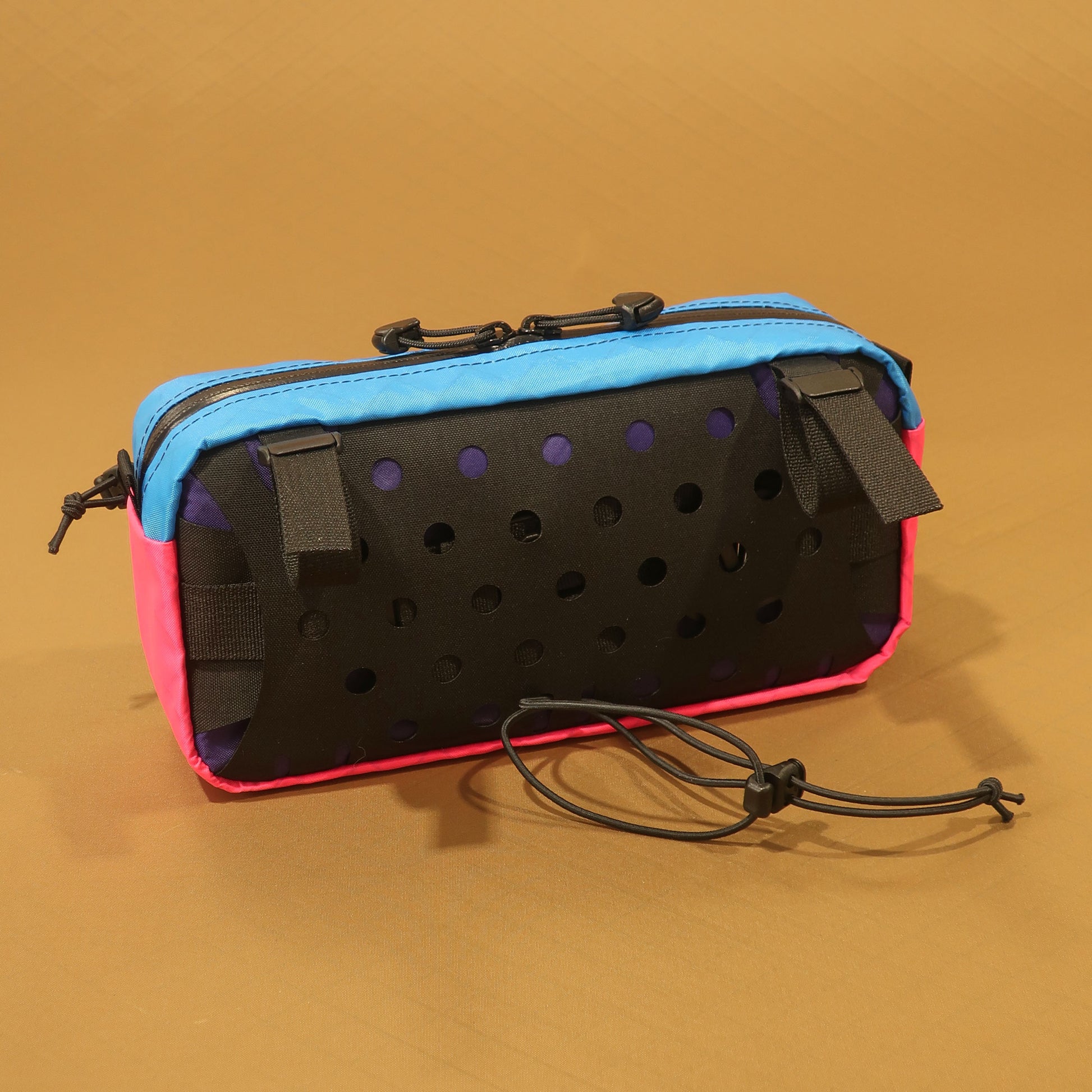 Limpet back panel in purple blue and pink EPX200 showing padded back and laser-cut strap sleeve made by Stealth Wellington NZ