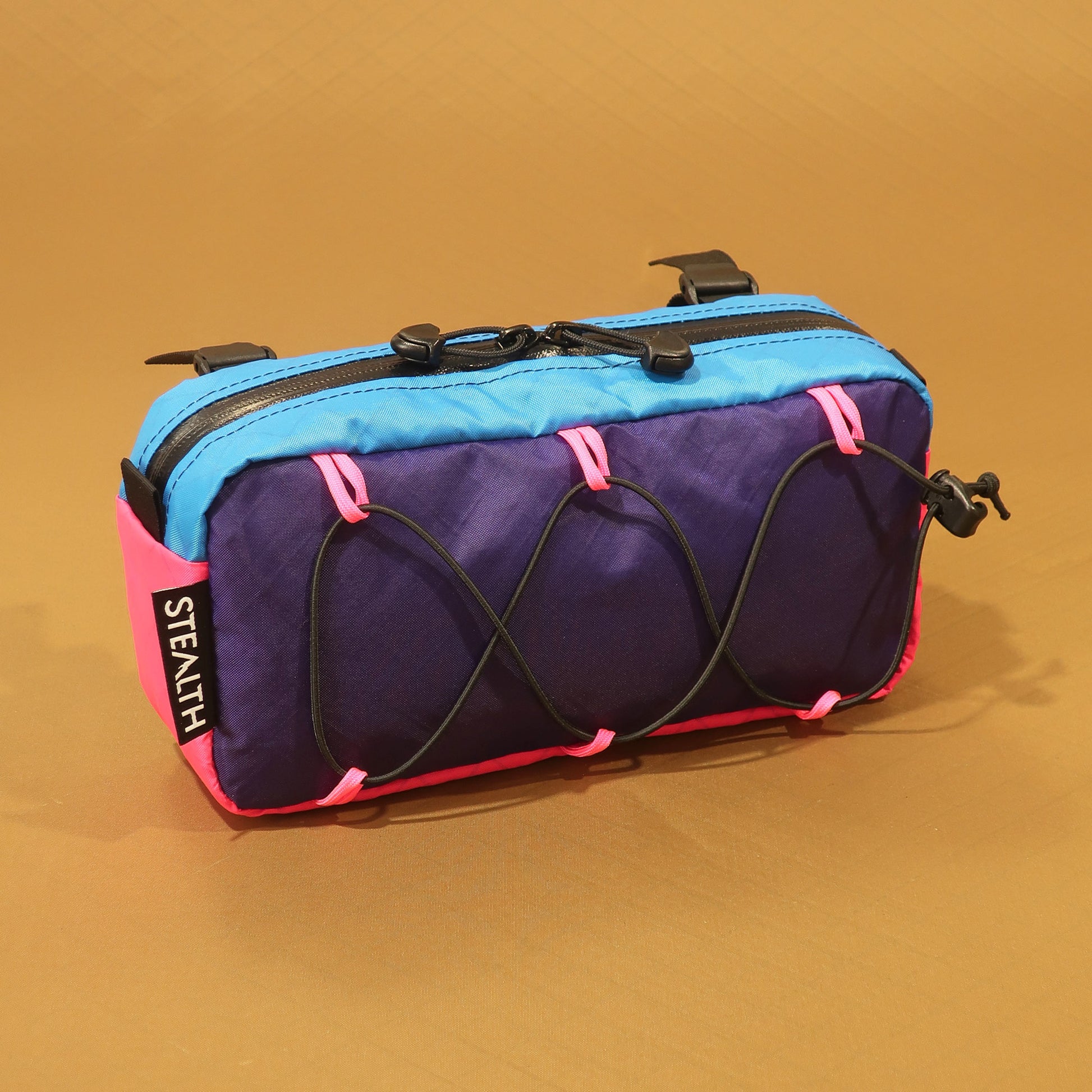 Limpet 2.5L handlebar bag in purple blue and pink EPX200 with bungee lashing and YKK zip made by Stealth Wellington NZ