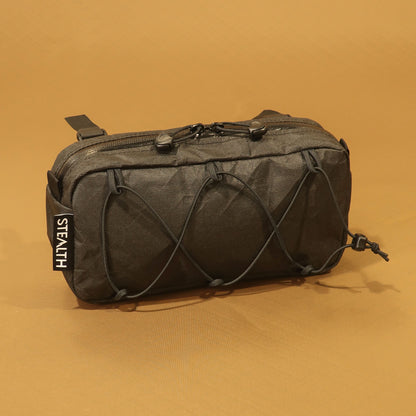 Limpet 2.5L bikepacking handlebar bag in black Ultra200x with bungee lashing and YKK zip made by Stealth Wellington NZ