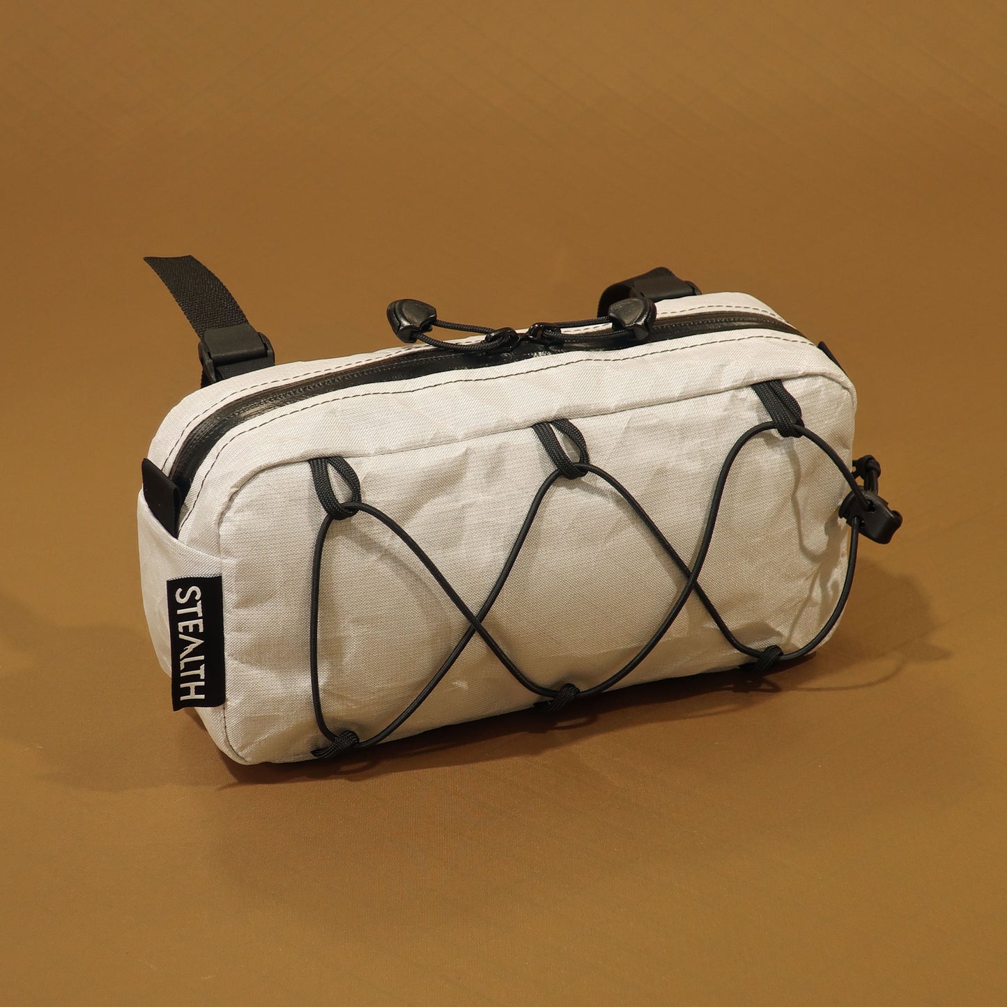 Limpet handlebar bumbag in white Ultra200x with bungee front pocket and camlock handlebar straps made by Stealth Wellington NZ
