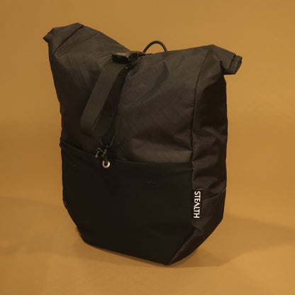 Mountain Pannier V2 10L in black with roll top and Ultra stretch front pocket made by Stealth Wellington NZ