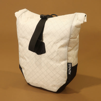White 8 litre Mountain Pannier with roll top closure, made from lightweight Ultra fabric for mountain biking and bikepacking