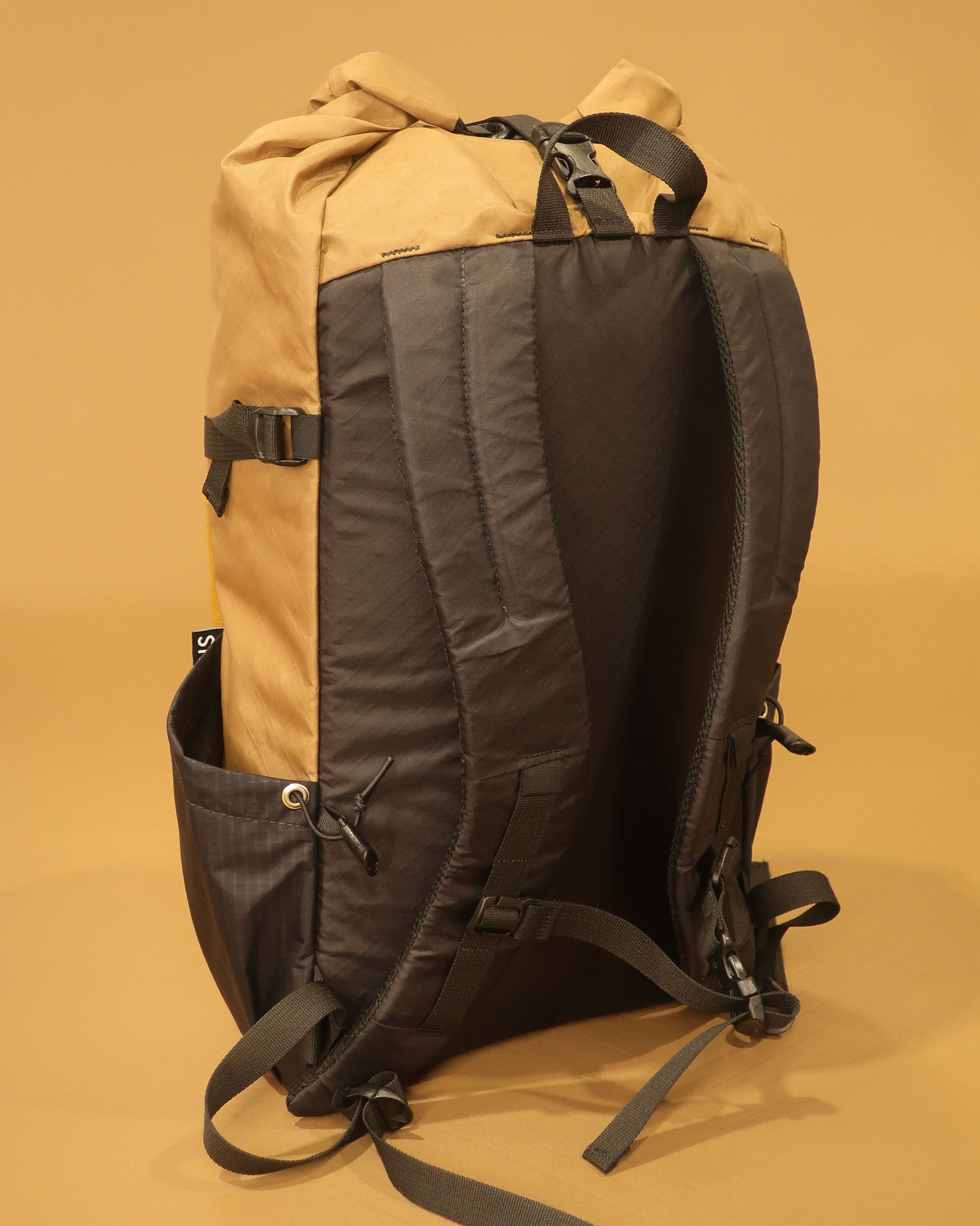 Rata 25 hiking backpack in coyote back panel showing padded shoulder straps and hip belt made by Stealth Wellington NZ