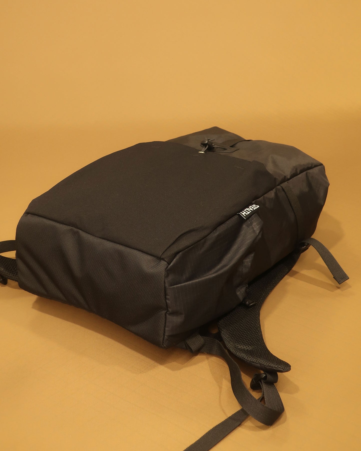 Rata 25 roll-top backpack bottom view showing ballistic nylon base panel made by Stealth Wellington NZ