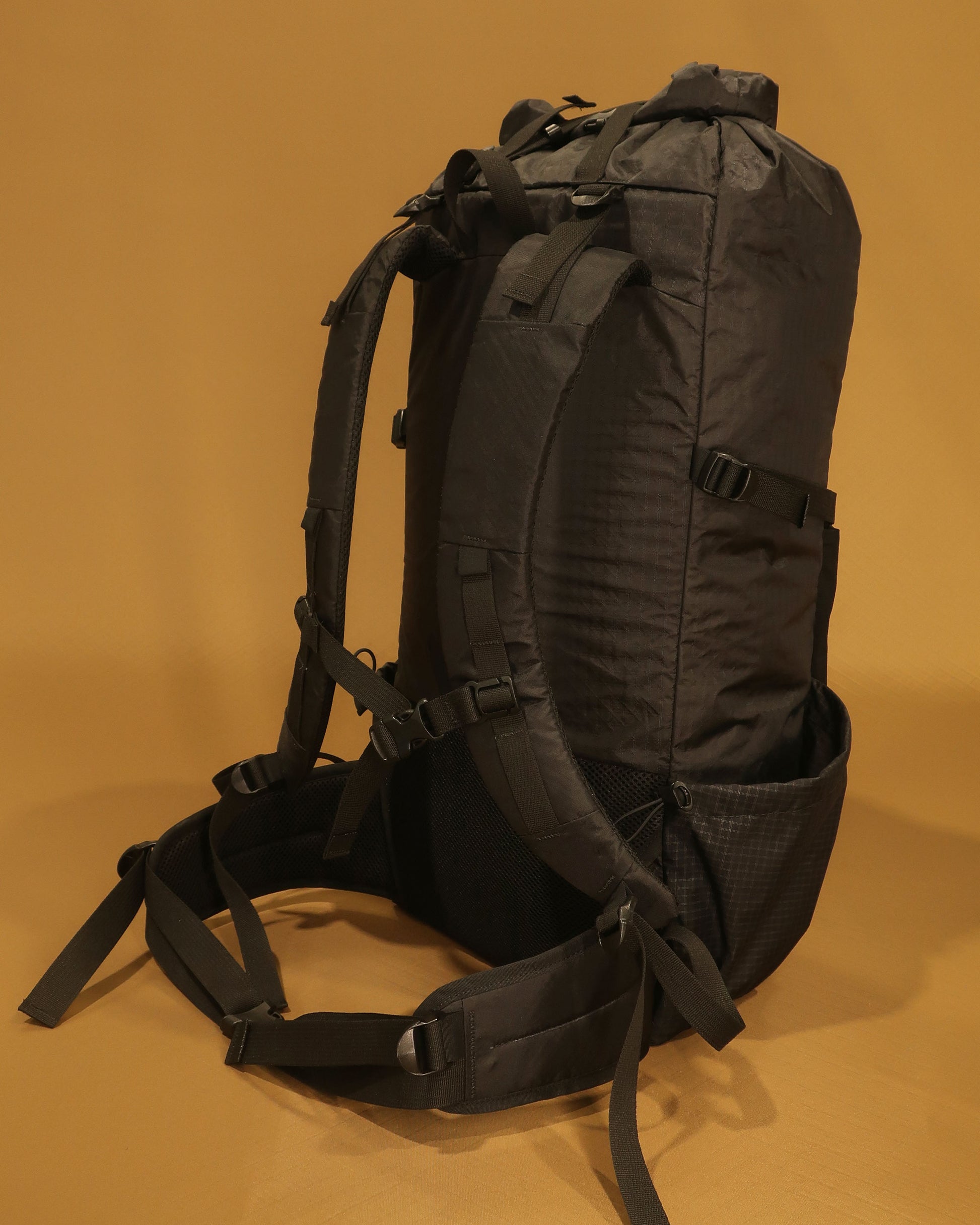 40L tramping pack showing S-shaped padded shoulder straps and removable hip belt, made by Stealth Wellington NZ