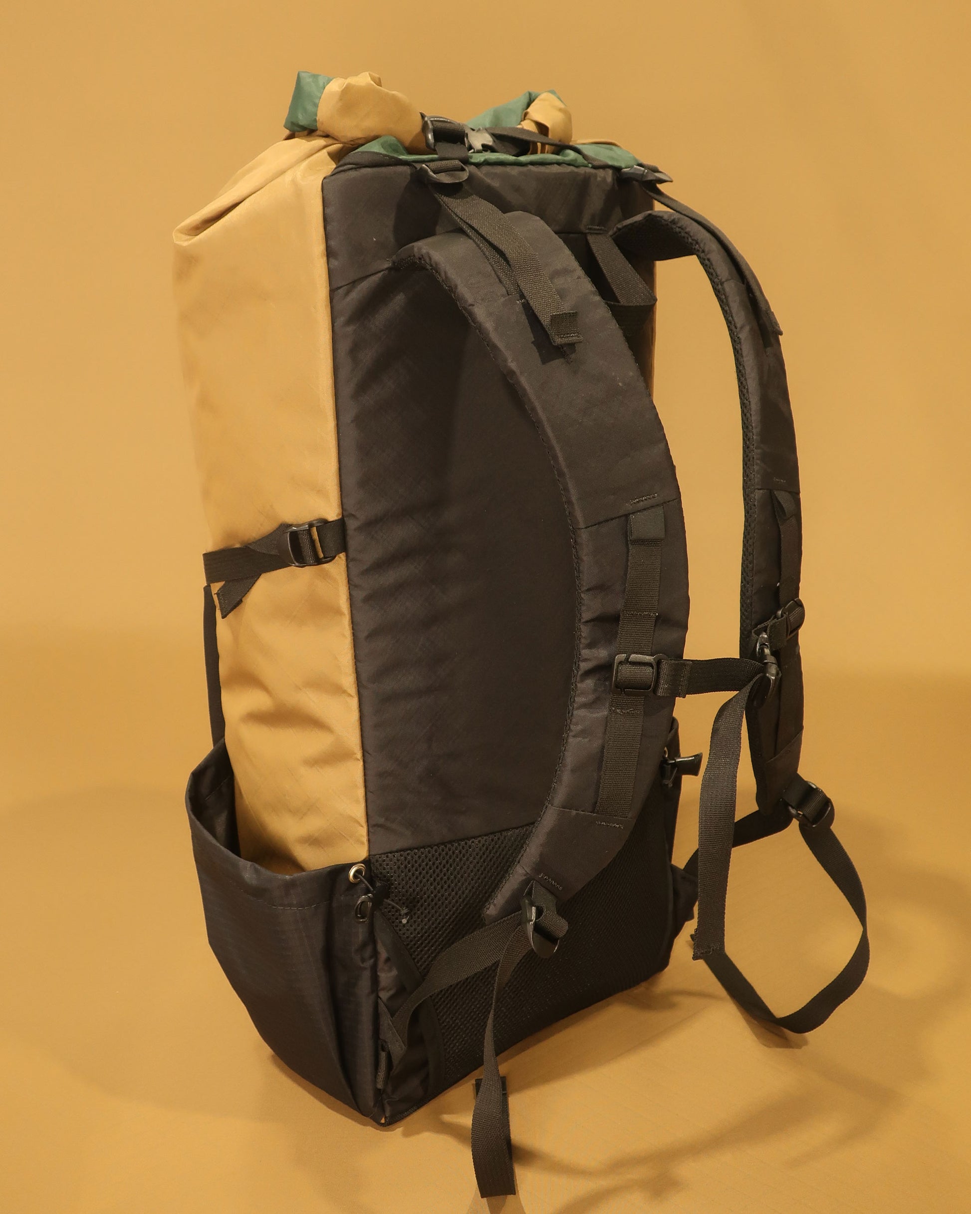 Rata 40 coyote tan tramping pack rear view showing S-shaped shoulder straps and padded back panel, made by Stealth Wellington NZ