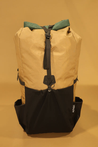 Coyote tan 40L hiking pack front view showing ultra-stretch pocket and compression strap, made by Stealth Wellington NZ
