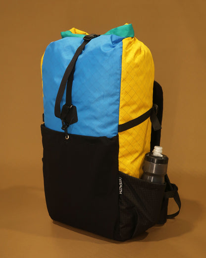 Rata 40 tramping pack with water bottle in Ultragrid side pocket, multicolour EPX200 version, made by Stealth Wellington NZ