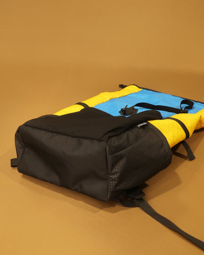 40L tramping pack base showing ballistic nylon panel, multicolour yellow and blue version, made by Stealth Wellington NZ
