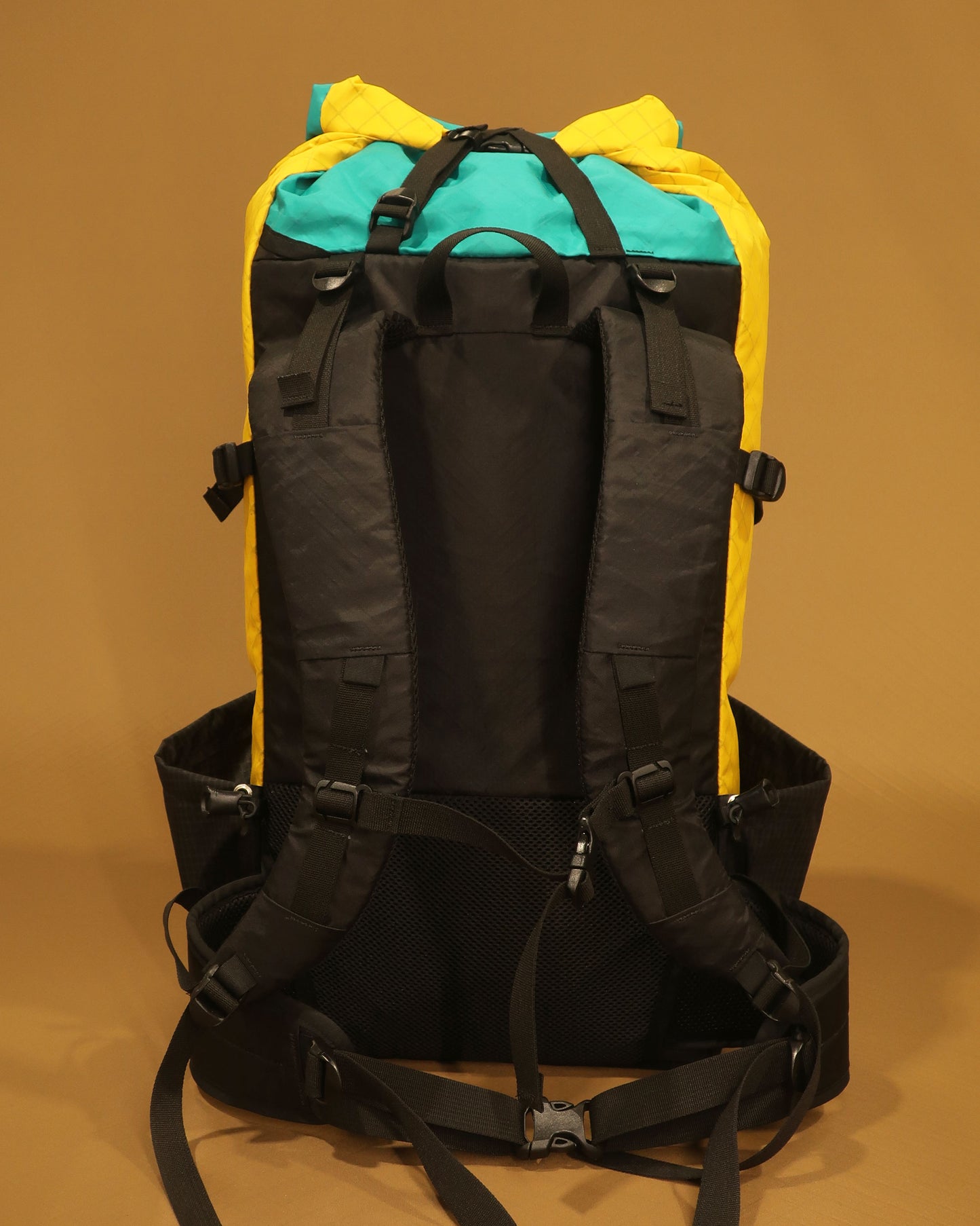 Rata 40 tramping pack rear view showing S-shaped shoulder straps and removable hip belt, made by Stealth Wellington NZ