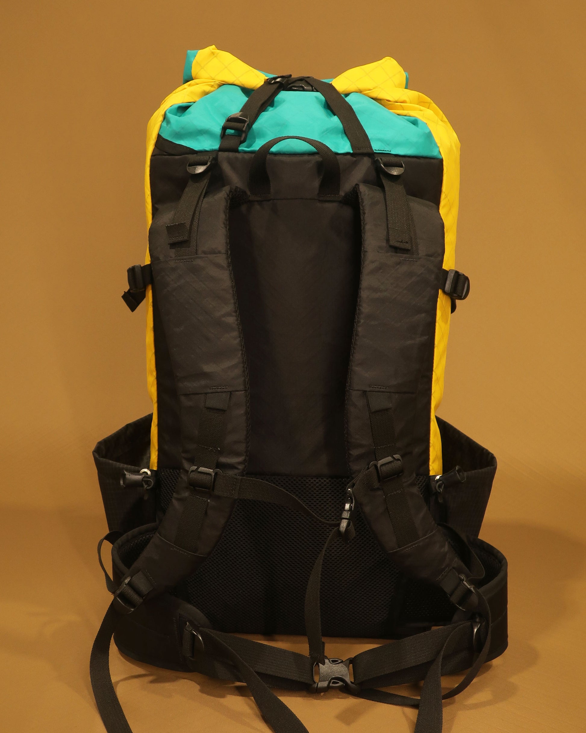 Rata 40 tramping pack rear view showing S-shaped shoulder straps and removable hip belt, made by Stealth Wellington NZ