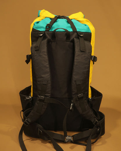 Rata 40 tramping pack rear view showing S-shaped shoulder straps and removable hip belt, made by Stealth Wellington NZ