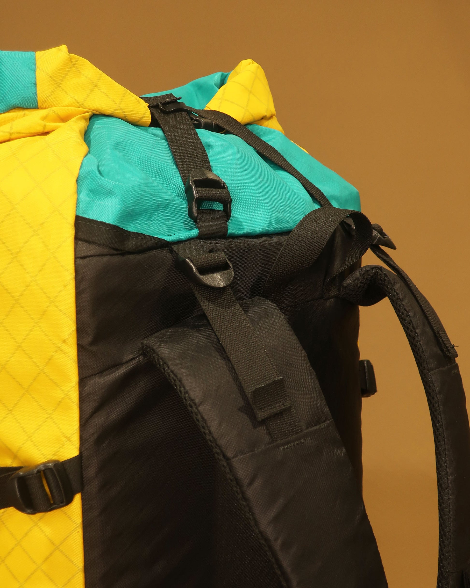 Rata 40 tramping pack top detail showing Y-strap and load lifter attachment points, made by Stealth Wellington NZ