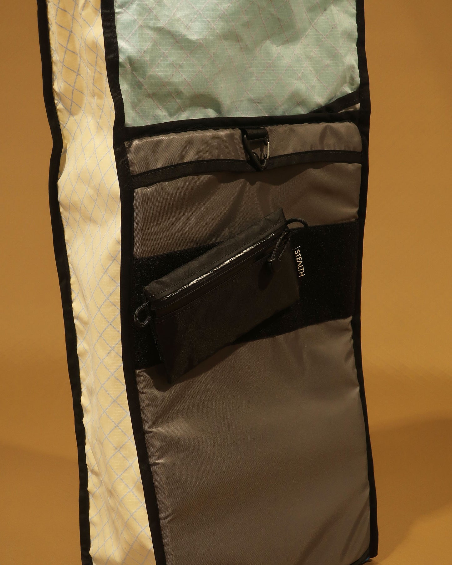 Rata 40 tramping pack optional internal zip pocket shown attached via velcro to back panel, made by Stealth Wellington NZ