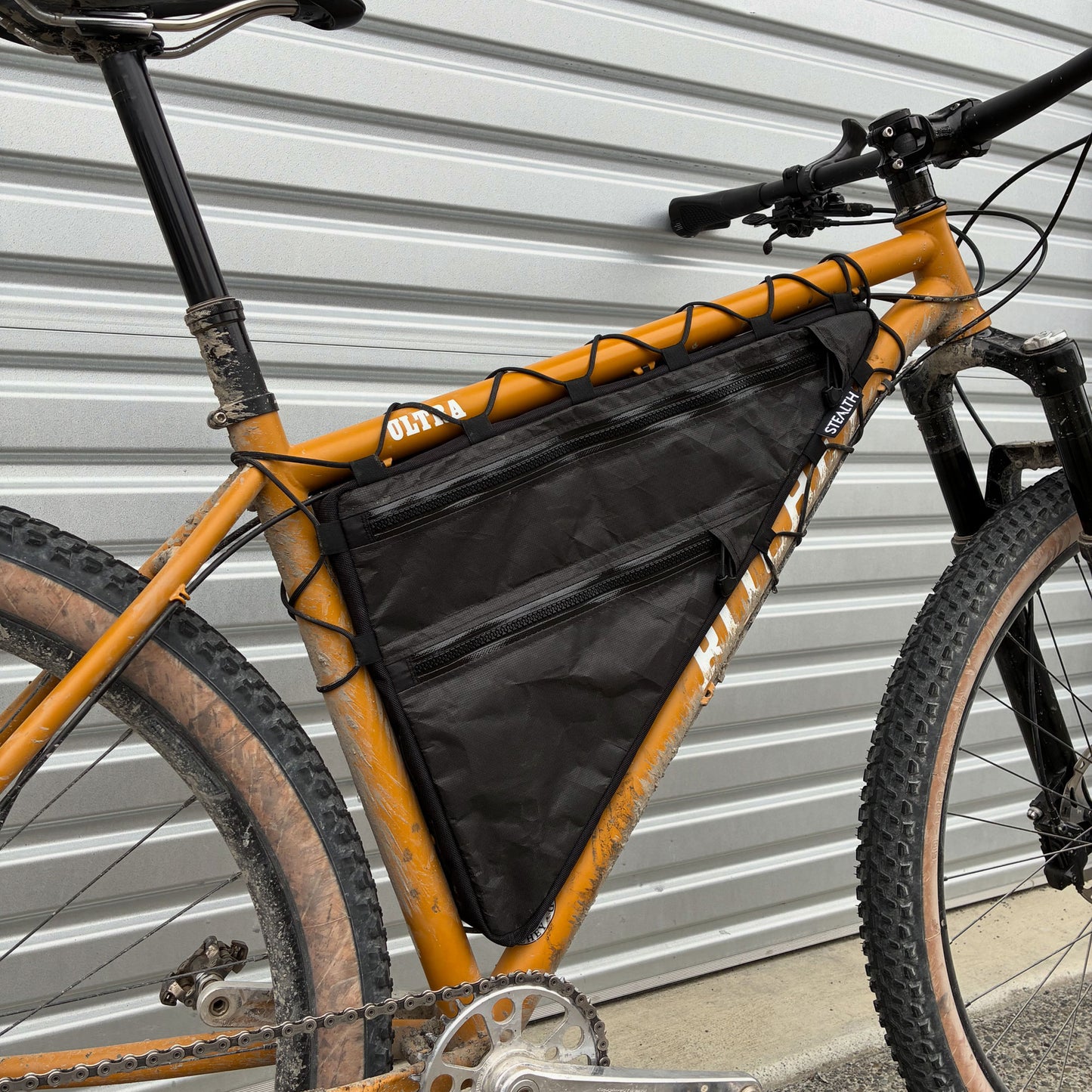 Ritchey Ultra custom full frame bag in black with lace-up and bolt-on attachment and double zips made by Stealth Wellington NZ