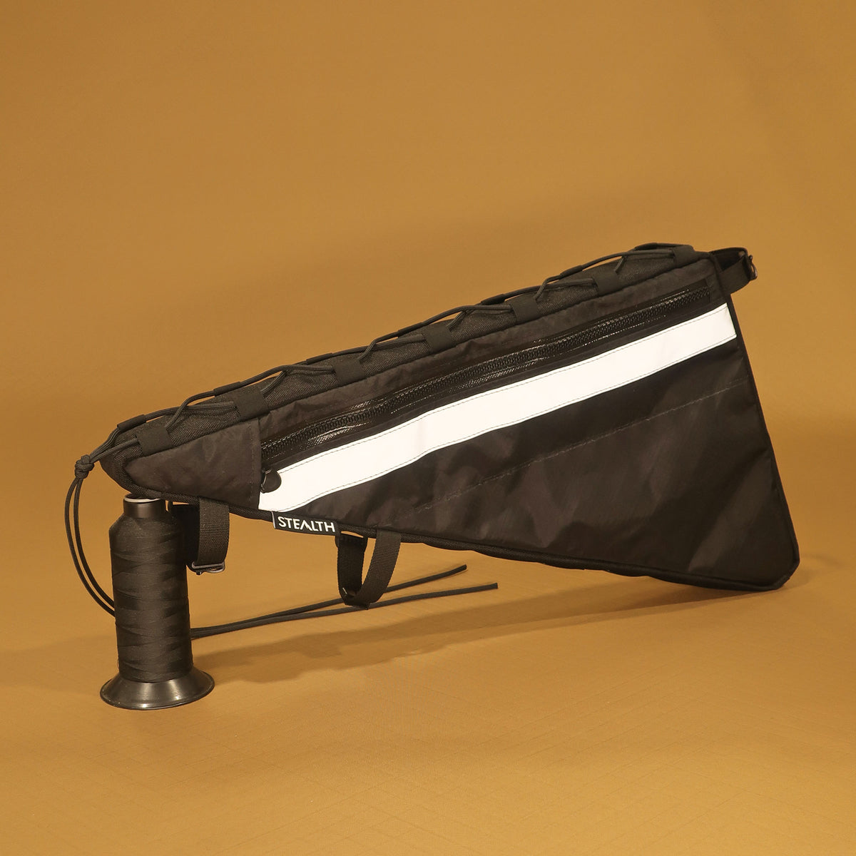 Handmade black double zip full frame bag with external lacing and map pocket, designed for Salsa Fargo gravel bike