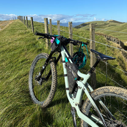 Scott full suspension bikepacking frame bag in Multicam Black with teal accents custom made by Stealth Wellington NZ